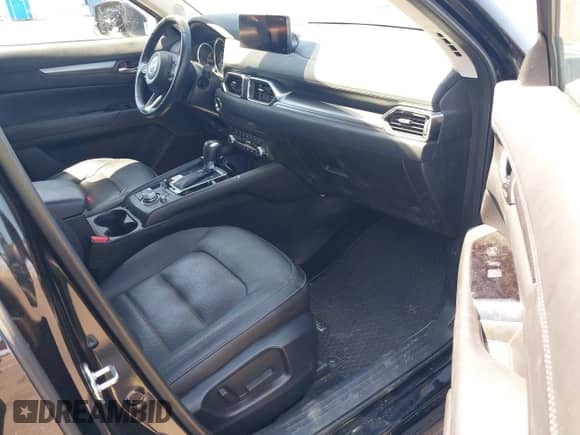 2023 Mazda CX-5 S Preferred z VIN JM3KFBCM1P0131456, wystawiony jako IAAI lot #42696205 z przebiegiem 65 060 mil mil oraz . Historia ofert i sprzedaży dostępna na DreamBid. Obrazek 5.