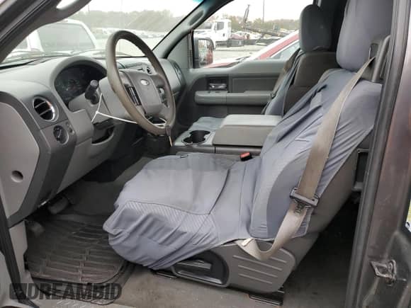 2005 Ford F-150 XLT z VIN 1FTPX14525FA51722, wystawiony jako Copart lot #90405425 z przebiegiem 232 513 mil mil oraz Czysty tytuł • Clean title. Historia ofert i sprzedaży dostępna na DreamBid. Obrazek 7.