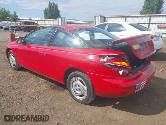 1997 Saturn 2dr Coupe with VIN 1G8ZH1272VZ206904, listed as a IAAI auction lot 43012660 with 159,456 mi miles and . Bid and sale history available at DreamBid. Image 3.
