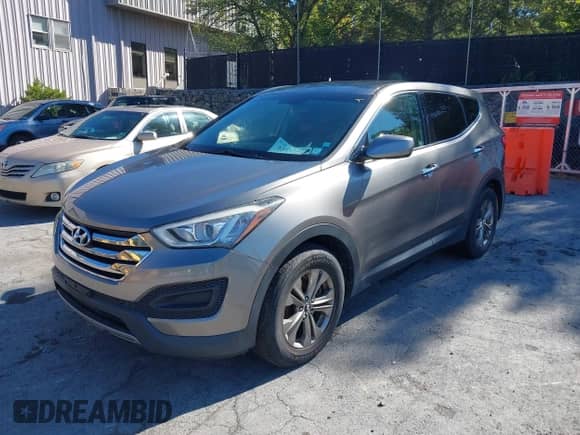 2014 Hyundai Santa Fe z VIN 5XYZTDLB8EG144660, wystawiony jako IAAI lot #43177925 z przebiegiem 149 685 mil mil oraz . Historia ofert i sprzedaży dostępna na DreamBid. Obrazek 17.