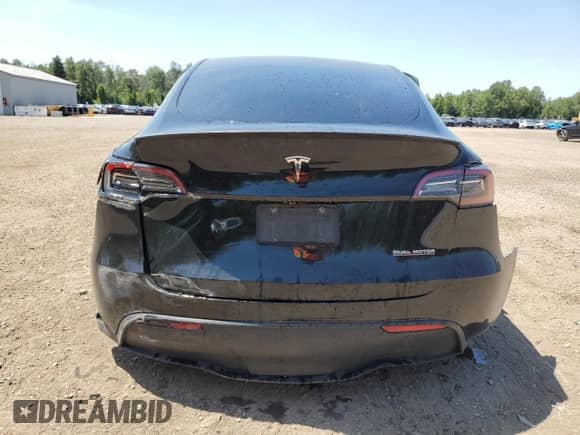 2022 Tesla Model Y Performance with VIN 7SAYGDEF6NF338954, listed as a Copart auction lot 65754475 with 102,857 mi miles and Salvage title. Bid and sale history available at DreamBid. Image 6.
