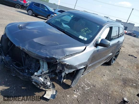 2016 Jeep Grand Cherokee SRT with VIN 1C4RJFDJ7GC359753, listed as a IAAI auction lot 42998753 with 88,855 mi miles and . Bid and sale history available at DreamBid. Image 2.