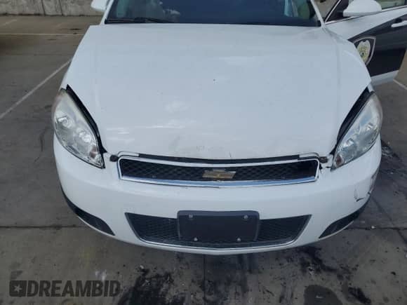 2014 Chevrolet Impala Police Police с VIN 2G1WD5E35E1158658, выставлен на аукционе Copart как лот 70806365 с пробегом Не указан миль и Списание • Salvage title. История ставок и продаж доступна на DreamBid. Изображение 11.