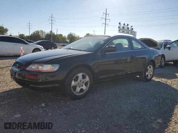 2000 Honda Accord EX with VIN 1HGCG2256YA040149, listed as a Copart auction lot 84937695 with 227,417 mi miles and Salvage title. Bid and sale history available at DreamBid. Image 1.