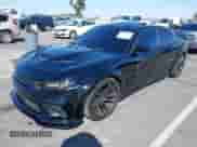 2023 Dodge Charger Scat Pack with VIN 2C3CDXGJ4PH584373, listed as a IAAI auction lot 43016093 with 33,016 mi miles and . Bid and sale history available at DreamBid. Image 2.