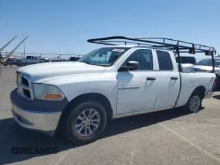 2012 Ram 1500 Tradesman with VIN 1C6RD6FP0CS289724, listed as a Copart auction lot 66648955 with 205,151 mi miles and Salvage title. Bid and sale history available at DreamBid. Image 1.