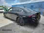 2023 Honda Accord Touring with VIN 1HGCY2F87PA028866, listed as a Copart auction lot 63202525 with 10,744 mi miles and Salvage title. Bid and sale history available at DreamBid. Image 2.