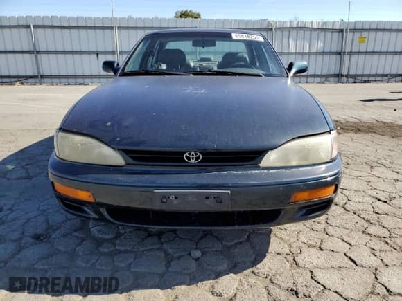 1995 Toyota Camry LE z VIN JT2GK12E3S0117364, wystawiony jako Copart lot #65818255 z przebiegiem 215 464 mil mil oraz Szkoda całkowita • Salvage title. Historia ofert i sprzedaży dostępna na DreamBid. Obrazek 5.