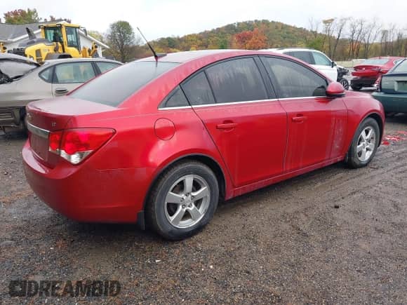 2013 Chevrolet Cruze 1LT with VIN 1G1PC5SB5D7319028, listed as a IAAI auction lot 43590172 with 169,646 mi miles and . Bid and sale history available at DreamBid. Image 4.