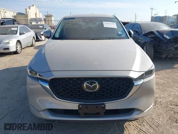 2025 Mazda CX-5 S Preferred z VIN JM3KFBCL1S0639717, wystawiony jako IAAI lot #43416760 z przebiegiem 10 149 mil mil oraz . Historia ofert i sprzedaży dostępna na DreamBid. Obrazek 12.