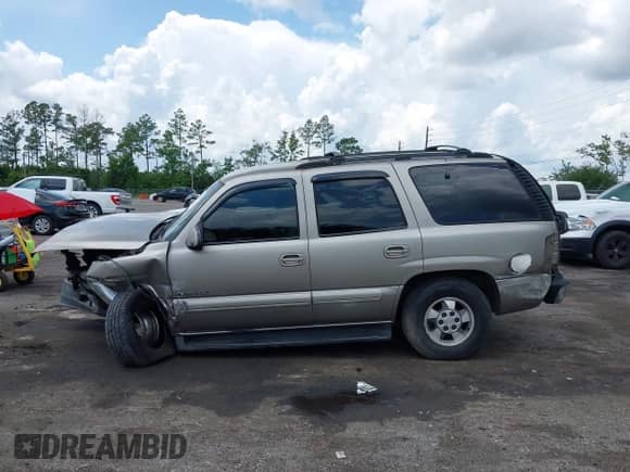 2001 Chevrolet Tahoe LS with VIN 1GNEC13T11R149532, listed as a IAAI auction lot 42914157 with 307,073 mi miles and . Bid and sale history available at DreamBid. Image 15.