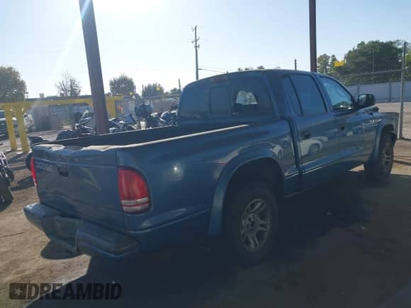2002 Dodge Dakota Sport with VIN 1B7HL38N22S652119, listed as a IAAI auction lot 43395458 with 162,733 mi miles and . Bid and sale history available at DreamBid. Image 4.