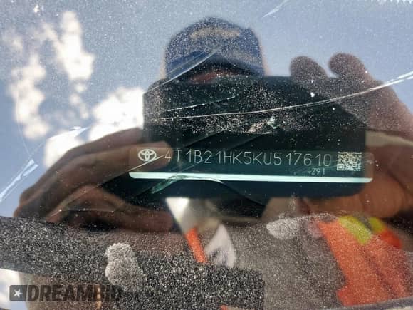 2019 Toyota Camry Hybrid LE с VIN 4T1B21HK5KU517610, выставлен на аукционе Copart как лот 63081855 с пробегом 120 270 миль миль и Списание • Salvage title. История ставок и продаж доступна на DreamBid. Изображение 12.