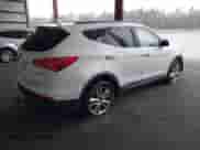 2015 Hyundai Santa Fe with VIN 5XYZWDLA2FG257231, listed as a IAAI auction lot 41868240 with 218,321 mi miles and . Bid and sale history available at DreamBid. Image 4.