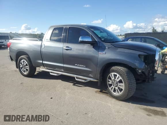 2007 Toyota Tundra SR5 с VIN 5TBRV541X7S455818, выставлен на аукционе Copart как лот 86850865 с пробегом 214 710 миль миль и Списание • Salvage title. История ставок и продаж доступна на DreamBid. Изображение 4.
