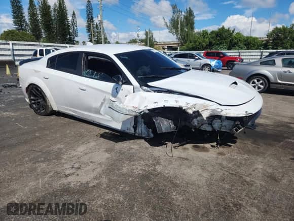 2023 Dodge Charger Scat Pack z VIN 2C3CDXGJ2PH646143, wystawiony jako Copart lot #85075215 z przebiegiem 31 823 mil mil oraz Nie do naprawy • Non repairable. Historia ofert i sprzedaży dostępna na DreamBid. Obrazek 4.