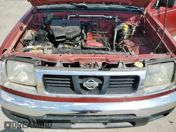 1998 Nissan Frontier XE with VIN 1N6DD26S7WC354452, listed as a Copart auction lot 80943795 with 215,313 mi miles and Salvage title. Bid and sale history available at DreamBid. Image 11.