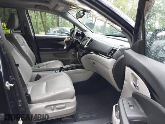 2016 Honda Pilot Touring with VIN 5FNYF6H9XGB034420, listed as a IAAI auction lot 42262958 with 162,877 mi miles and . Bid and sale history available at DreamBid. Image 5.