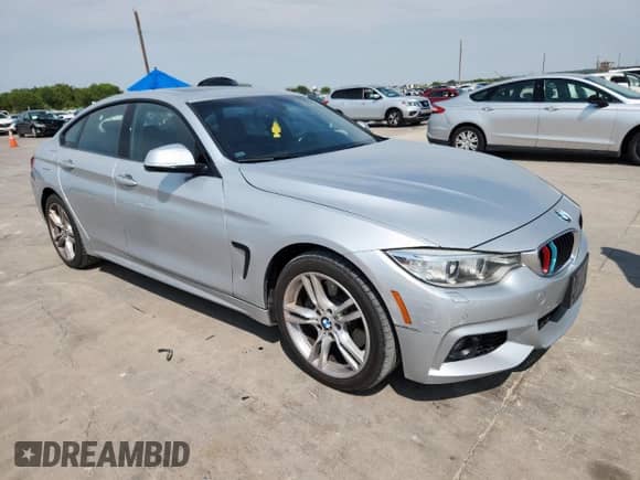 2016 BMW 4 Series 428i xDrive with VIN WBA4C9C53GG139770, listed as a Copart auction lot 71739055 with 108,586 mi miles and Clean title. Bid and sale history available at DreamBid. Image 4.