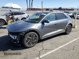 2023 Hyundai Ioniq 5 Limited с VIN KM8KR4AEXPU207199, выставлен на аукционе Copart как лот 70497215 с пробегом 35 554 миль миль и Списание • Salvage title. История ставок и продаж доступна на DreamBid. Изображение 1.