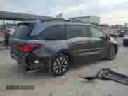 2025 Honda Odyssey EX-L with VIN 5FNRL6H65SB037589, listed as a Copart auction lot 80814375 with 7,840 mi miles and Salvage title. Bid and sale history available at DreamBid. Image 3.