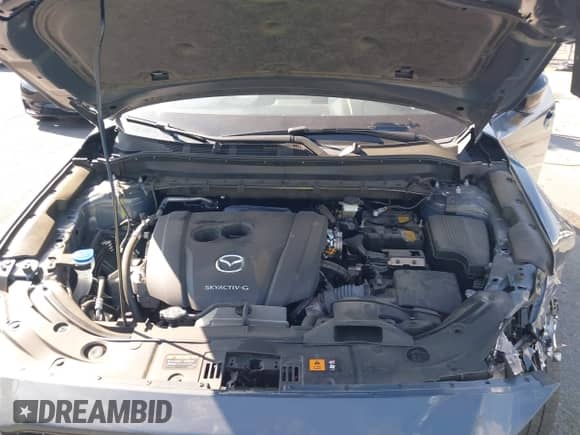 2023 Mazda CX-5 S Carbon Edition z VIN JM3KFBCM6P0252838, wystawiony jako IAAI lot #43248566 z przebiegiem 37 599 mil mil oraz . Historia ofert i sprzedaży dostępna na DreamBid. Obrazek 10.