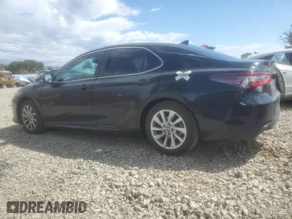 2023 Toyota Camry LE z VIN 4T1C11AK2PU156068, wystawiony jako Copart lot #81776895 z przebiegiem 28 144 mil mil oraz Szkoda całkowita • Salvage title. Historia ofert i sprzedaży dostępna na DreamBid. Obrazek 2.