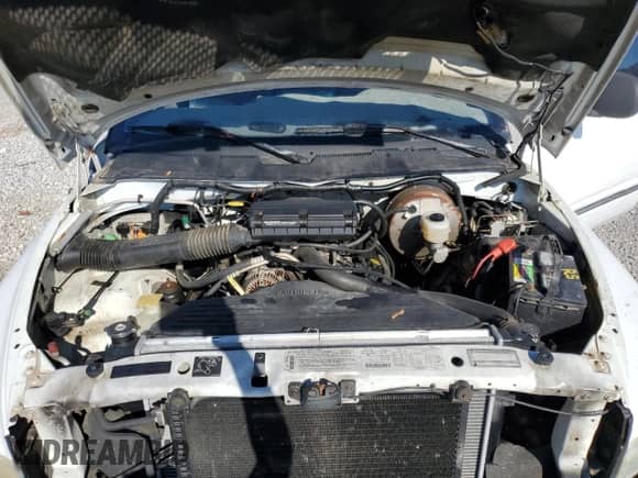 1999 Dodge 2500 with VIN 1B7KF23Z6XJ558288, listed as a Copart auction lot 86252004 with 251,023 mi miles and Salvage title. Bid and sale history available at DreamBid. Image 11.