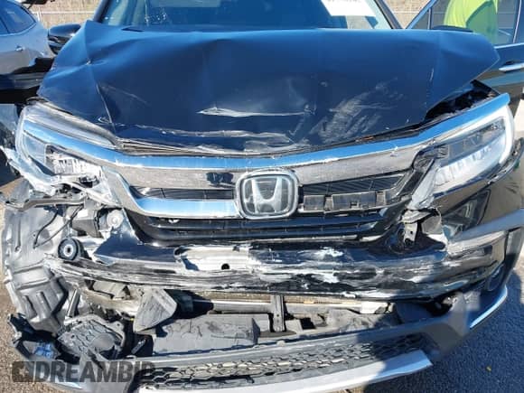 2020 Honda Pilot Touring 7-Passenger z VIN 5FNYF5H64LB006073, wystawiony jako IAAI lot #41750282 z przebiegiem 73 214 mil mil oraz . Historia ofert i sprzedaży dostępna na DreamBid. Obrazek 10.