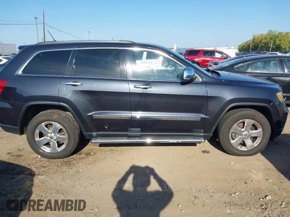 2013 Jeep Grand Cherokee Limited z VIN 1C4RJFBG4DC648995, wystawiony jako IAAI lot #43338050 z przebiegiem 138 551 mil mil oraz . Historia ofert i sprzedaży dostępna na DreamBid. Obrazek 13.