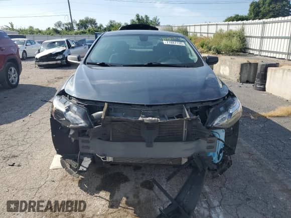 2020 Chevrolet Malibu LS z VIN 1G1ZB5ST8LF138014, wystawiony jako Copart lot #71887135 z przebiegiem 70 275 mil mil oraz Szkoda całkowita • Salvage title. Historia ofert i sprzedaży dostępna na DreamBid. Obrazek 5.
