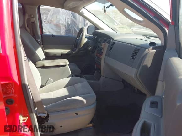 2005 Dodge Durango SLT z VIN 1D4HD48D75F621636, wystawiony jako IAAI lot #41786036 z przebiegiem 220 395 mil mil oraz . Historia ofert i sprzedaży dostępna na DreamBid. Obrazek 5.