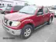 2010 Nissan Frontier Pro-4X with VIN 1N6AD0EVXAC427728, listed as a IAAI auction lot 41843049 with 163,484 mi miles and . Bid and sale history available at DreamBid. Image 2.