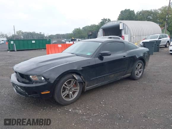 2012 Ford Mustang Premium with VIN 1ZVBP8AM7C5261635, listed as a IAAI auction lot 42981208 with 123,330 mi miles and . Bid and sale history available at DreamBid. Image 2.
