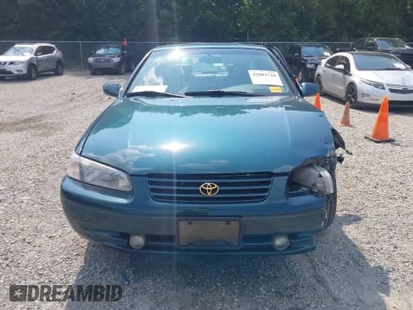 1997 Toyota Camry LE z VIN 4T1BF22K2VU922475, wystawiony jako IAAI lot #42883744 z przebiegiem 131 677 mil mil oraz . Historia ofert i sprzedaży dostępna na DreamBid. Obrazek 12.