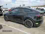2023 Tesla Model Y Long Range z VIN 7SAYGDEE8PA050456, wystawiony jako Copart lot #71989715 z przebiegiem 30 955 mil mil oraz Szkoda całkowita • Salvage title. Historia ofert i sprzedaży dostępna na DreamBid. Obrazek 2.