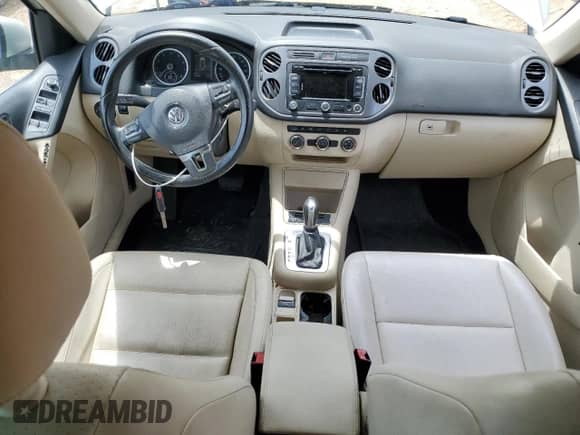 2013 Volkswagen Tiguan SE with VIN WVGAV7AX0DW556558, listed as a Copart auction lot 55574395 with 94,882 mi miles and Salvage title. Bid and sale history available at DreamBid. Image 8.