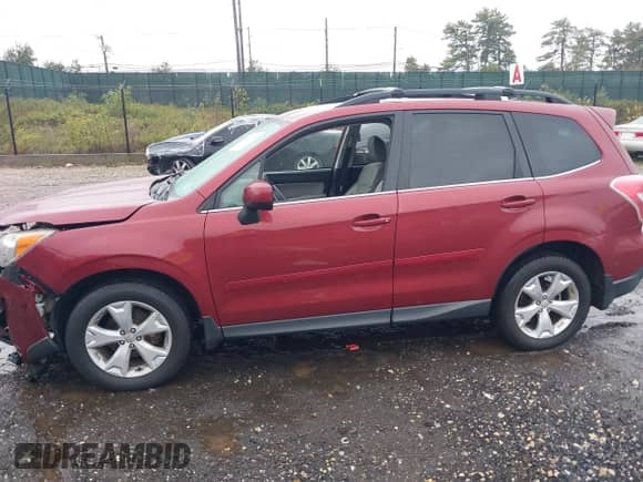 2014 Subaru Forester Limited z VIN JF2SJAHC9EH452369, wystawiony jako IAAI lot #43408275 z przebiegiem 142 629 mil mil oraz . Historia ofert i sprzedaży dostępna na DreamBid. Obrazek 14.