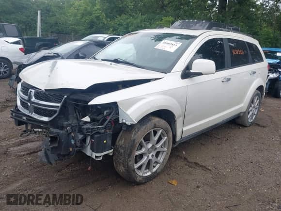 2012 Dodge Journey Crew with VIN 3C4PDCDG3CT342092, listed as a IAAI auction lot 42883811 with 153,298 mi miles and . Bid and sale history available at DreamBid. Image 2.