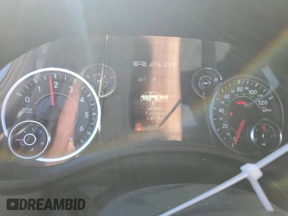 2023 Ram 1500 Tradesman z VIN 1C6RRFCG1PN675997, wystawiony jako Copart lot #86810044 z przebiegiem 31 272 mil mil oraz Nie do naprawy • Non repairable. Historia ofert i sprzedaży dostępna na DreamBid. Obrazek 9.