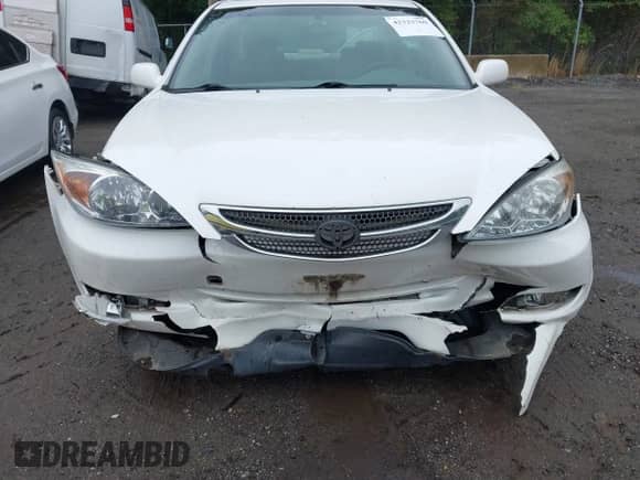 2004 Toyota Camry LE with VIN JTDBE32K740273954, listed as a IAAI auction lot 42323760 with 250,815 mi miles and . Bid and sale history available at DreamBid. Image 6.