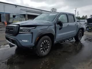 2023 Nissan Frontier Pro-4X with VIN 1N6ED1EK7PN651968, listed as a Copart auction lot 61585105 with 17,354 mi miles and Salvage title. Bid and sale history available at DreamBid. Image 1.