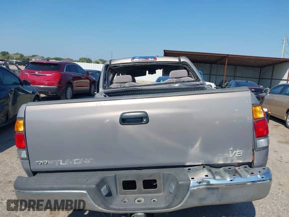 2002 Toyota Tundra Limited z VIN 5TBRT38152S228887, wystawiony jako IAAI lot #43129902 z przebiegiem Nie podano mil oraz . Historia ofert i sprzedaży dostępna na DreamBid. Obrazek 15.