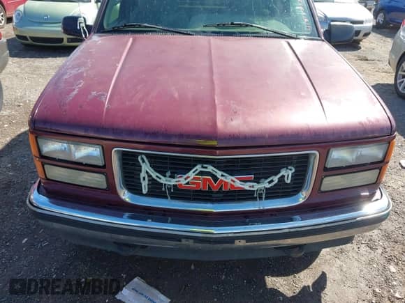 1996 GMC Sierra 1500 z VIN 2GTEC19M8T1563153, wystawiony jako IAAI lot #41812833 z przebiegiem 347 836 mil mil oraz . Historia ofert i sprzedaży dostępna na DreamBid. Obrazek 6.