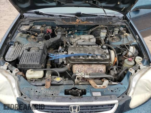 1997 Honda Civic z VIN JHMEJ8544VS002051, wystawiony jako Copart lot #58399195 z przebiegiem 239 283 mil mil oraz Szkoda całkowita • Salvage title. Historia ofert i sprzedaży dostępna na DreamBid. Obrazek 11.