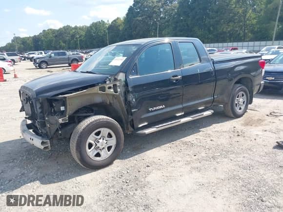 2012 Toyota Tundra z VIN 5TFRU5F11CX027728, wystawiony jako IAAI lot #43122765 z przebiegiem 196 119 mil mil oraz . Historia ofert i sprzedaży dostępna na DreamBid. Obrazek 2.