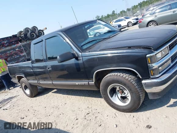 1998 Chevrolet Silverado 1500 z VIN 2GCEC19R7W1103854, wystawiony jako IAAI lot #43234033 z przebiegiem 276 944 mil mil oraz . Historia ofert i sprzedaży dostępna na DreamBid. Obrazek 13.