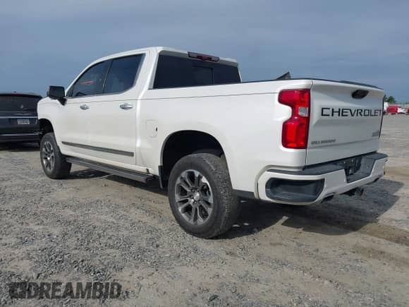 2022 Chevrolet Silverado 1500 High Country with VIN 1GCUDJED7NZ589980, listed as a IAAI auction lot 42373577 with 47,292 mi miles and . Bid and sale history available at DreamBid. Image 3.