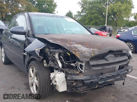 2007 Hyundai Accent SE z VIN KMHCN36C57U032765, wystawiony jako IAAI lot #43286052 z przebiegiem 70 080 mil mil oraz . Historia ofert i sprzedaży dostępna na DreamBid. Obrazek 1.