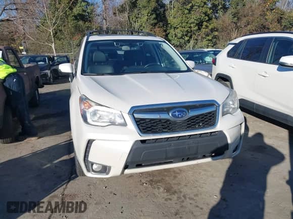2014 Subaru Forester XT Touring z VIN JF2SJGPC9EH417920, wystawiony jako IAAI lot #41270689 z przebiegiem 184 976 mil mil oraz . Historia ofert i sprzedaży dostępna na DreamBid. Obrazek 12.